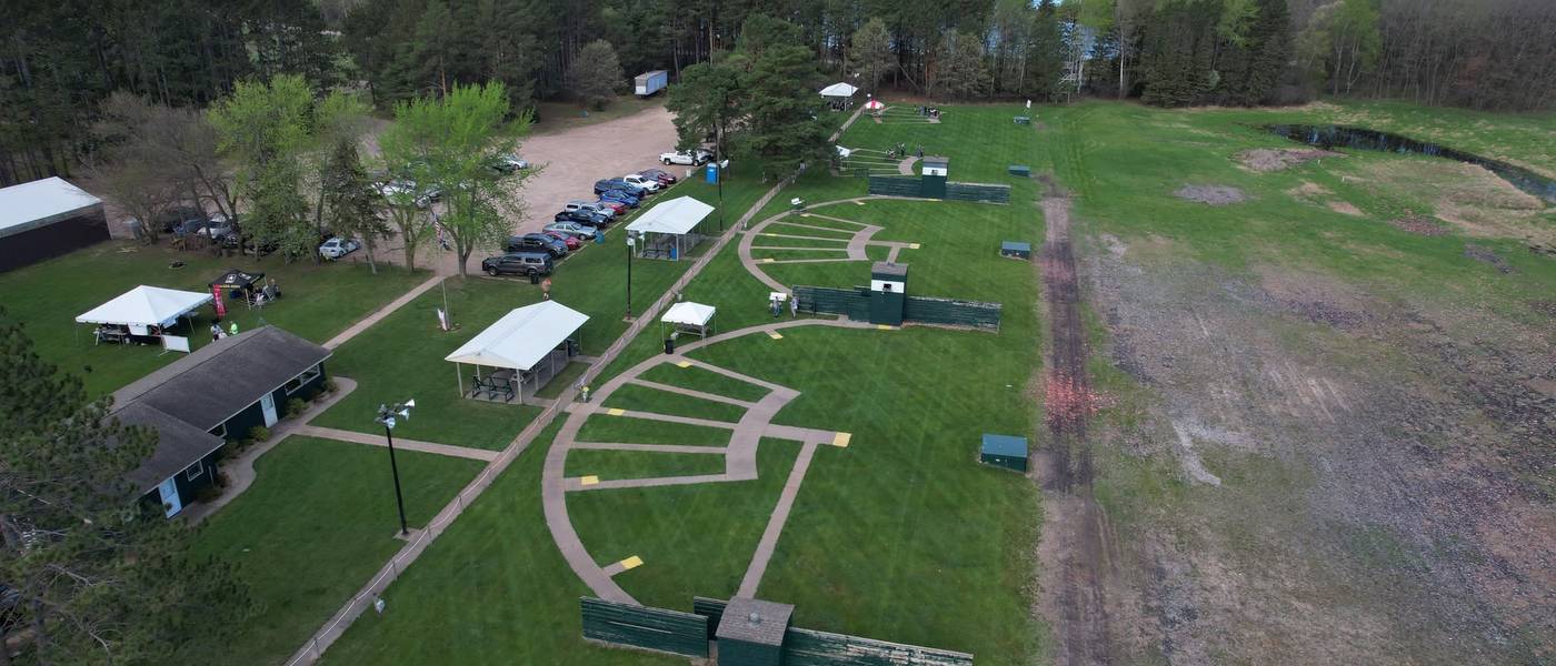 Aerial view of the Forest Lake Sportsmen's Club property showing the trap fields, clubhouse, pavilions and surrounding woodland and lake